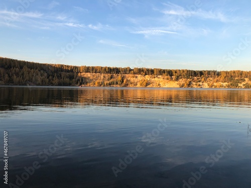 autumn forest on Dzerzhinsky lake, sunny evening © subbot