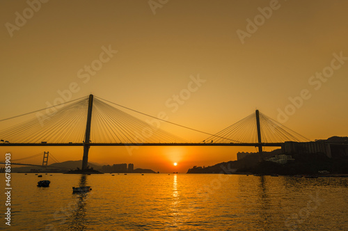 bridge in Hong Kong city under sunset