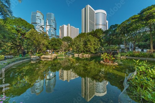 high rise office building and public park in central district of Hong Kong city
