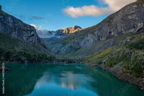 Mountain lake in Pyrenees Lac des Gloriettes during sunrise - France