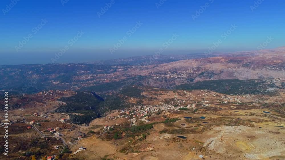 Aerial view of desert mountains and village Aerial view of desert mountains and village