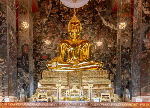 Giant golden Buddha statue inside Wat Suthat Temple in Bangkok Thailand