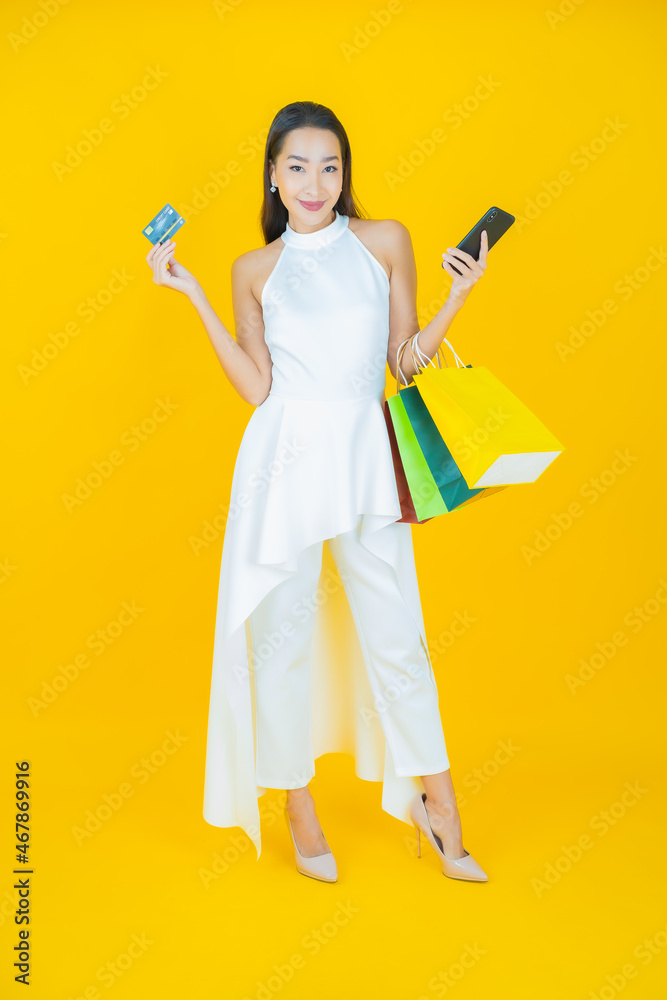 Portrait beautiful young asian woman smile with shopping bag Portrait beautiful young asian woman smile with shopping bag