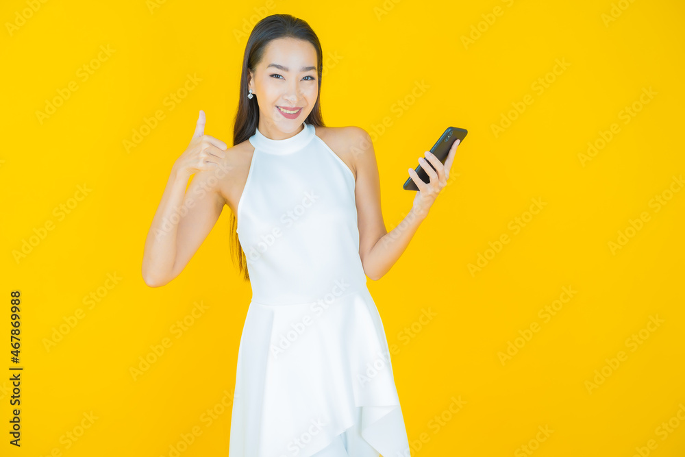 Portrait beautiful young asian woman smile with smart mobile phone Portrait beautiful young asian woman smile with smart mobile phone