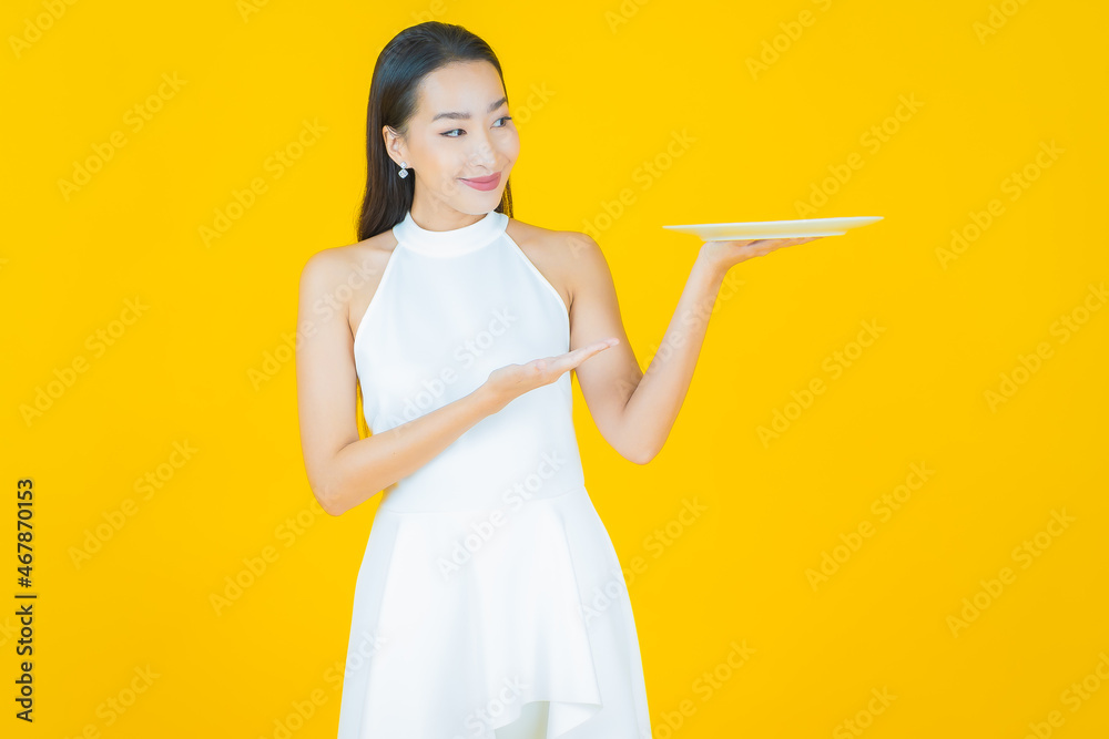 Portrait beautiful young asian woman smile with empty plate dish Portrait beautiful young asian woman smile with empty plate dish