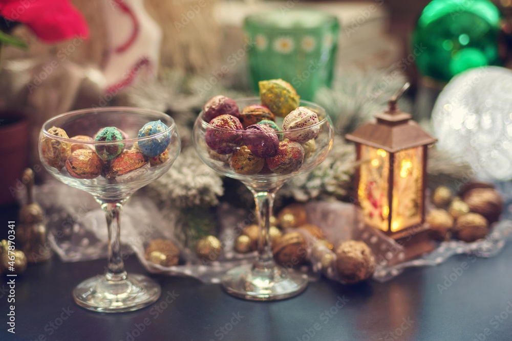 Holiday Christmas decoration still life with colorful walnuts, selective focus
