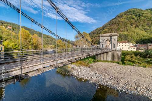 The ancient Ponte delle Catene bridge, that connects Chifenti with Fornoli, Lucca, Italy, above the Lima stream
