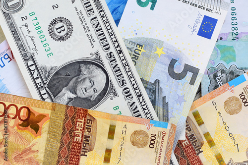 Banknotes of the USA, Europe, Russia and Kazakhstan. Currency exchange concept. International financial relations. Money background. Flat lay. Selective focus.