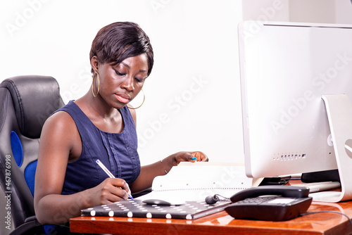 young concentrated businesswoman working in office.