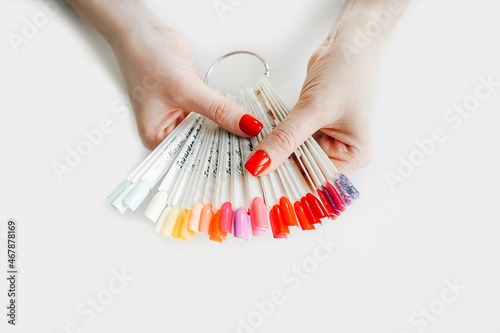 Top view of womans hands show color palette. photo