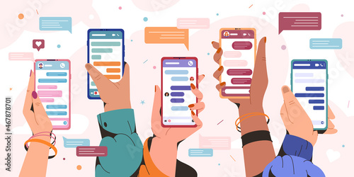 Hands holding smartphones with message chart. People chatting with friends and sending new messages. Sms bubbles boxes on mobile phone screen. Social media communication concept in flat style. photo