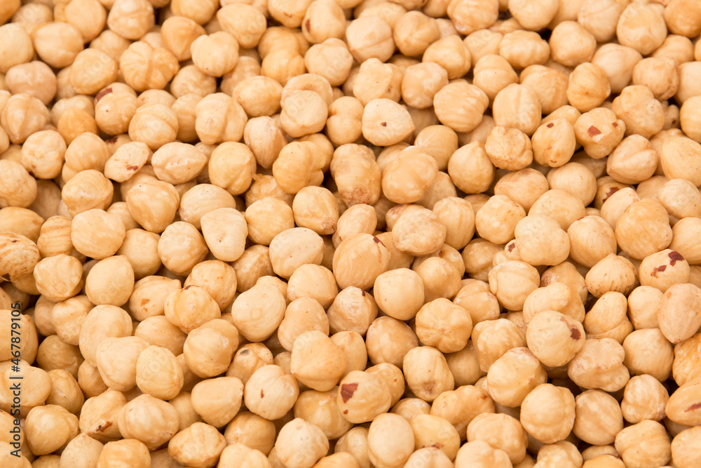 Peeled hazelnuts. Large hazelnut. A lot of nuts close up. Peeled hazelnuts. Large hazelnut. A lot of nuts close up.