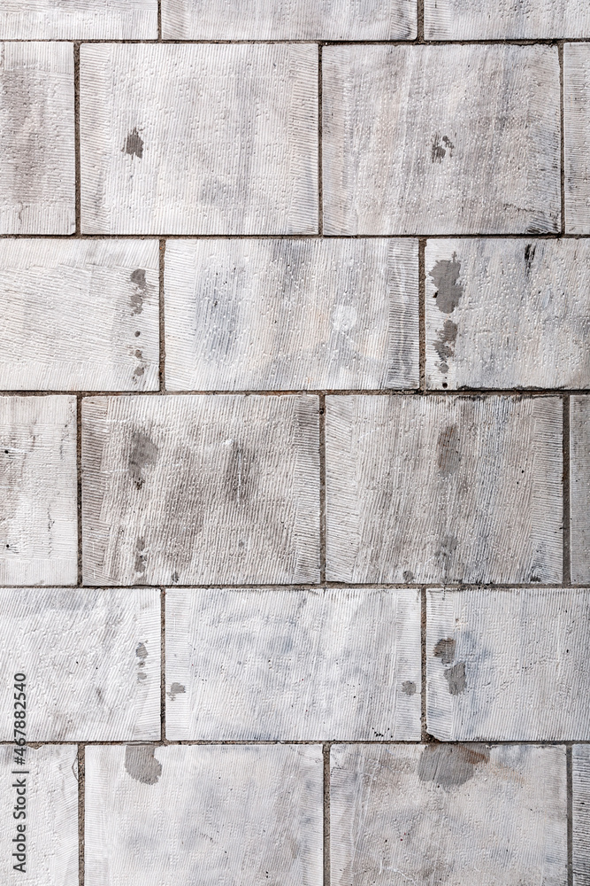 Naklejka premium Natural stone tiled blocks close up texture background
