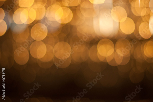 Holiday lights on a city streets on december night. Holiday background. S