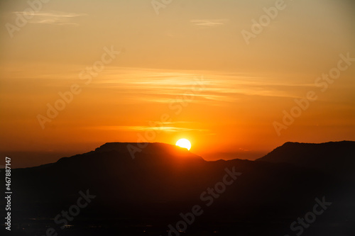 The sun was setting on the edge of the ridge Mountain. sunset