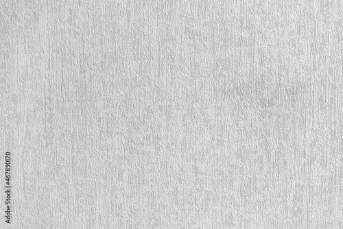 White concrete wall texture background. cement wall. plaster texture for designers. Rough empty relief stucco wall.