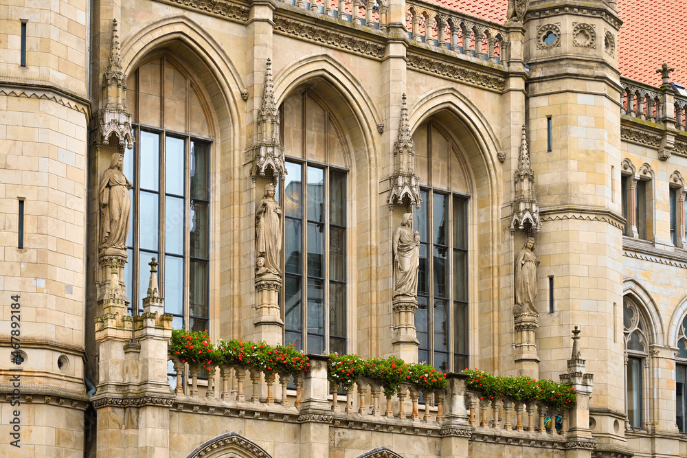 Obraz premium Town Hall in Braunschweig, Lower Saxony, Germany. Neo-Gothic City Hall, Gothic Revival architecture. Old town in Brunswick, Germany. 