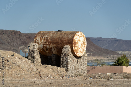 Old tank water in San Juanico village Baja California Sur Mexico photo