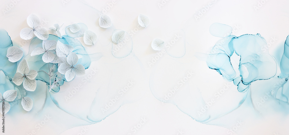 Creative image of pastel blue Hydrangea flowers on artistic ink background. Top view with copy space Creative image of pastel blue Hydrangea flowers on artistic ink background. Top view with copy space
