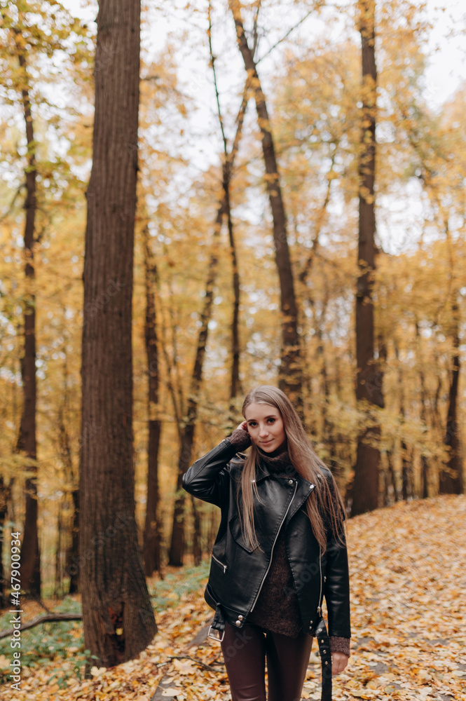 beautiful girl with blonde long hair in autumn park beautiful girl with blonde long hair in autumn park