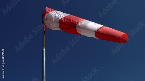 windsock Wind direction and intensity sign on helicopters and airfields. Wind cone used in aviation. Airport wind gauge.