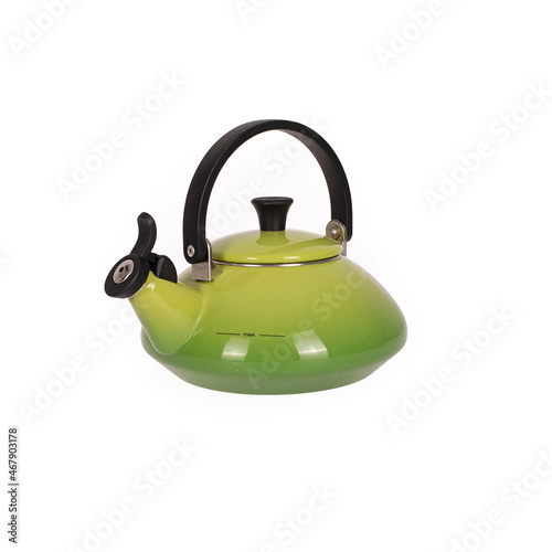 old green teapot on white background photo