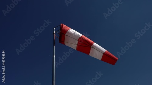 windsock Wind direction and intensity sign on helicopters and airfields. Wind cone used in aviation. Airport wind gauge.