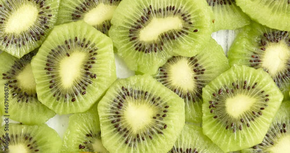 Slider shot of fresh sliced kiwi overhead view
Slider shot of fresh sliced kiwi overhead view