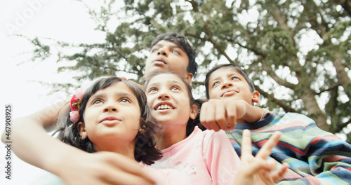 Photography Group photo of four little siblings from Inida