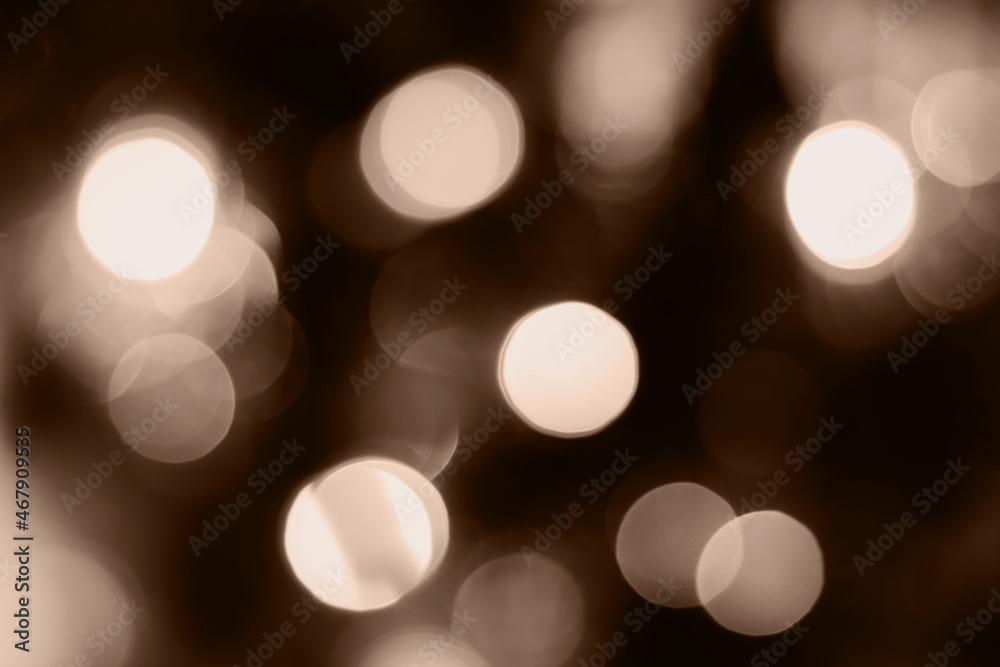 Obraz premium Blurred lights brown background. Abstract bokeh with soft light