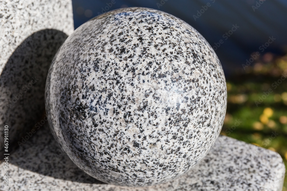 Naklejka Polished granite ball as element of a building exterior decoration