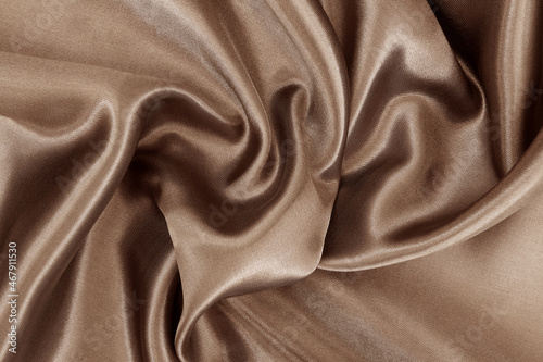 Dark brown fabric texture background, detail of silk or linen pattern.