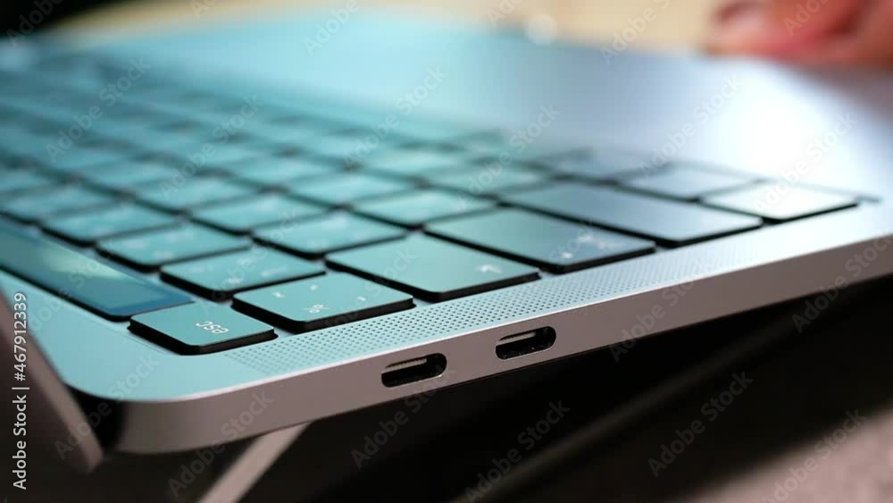 Selective focus of woman hand open laptop for online the internet to work from home or shopping in the website