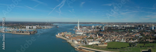 Portsmouth City aerial panorama with Spice Island next to the entrance to the harbour and the Spinnaker Tower in view.  photo