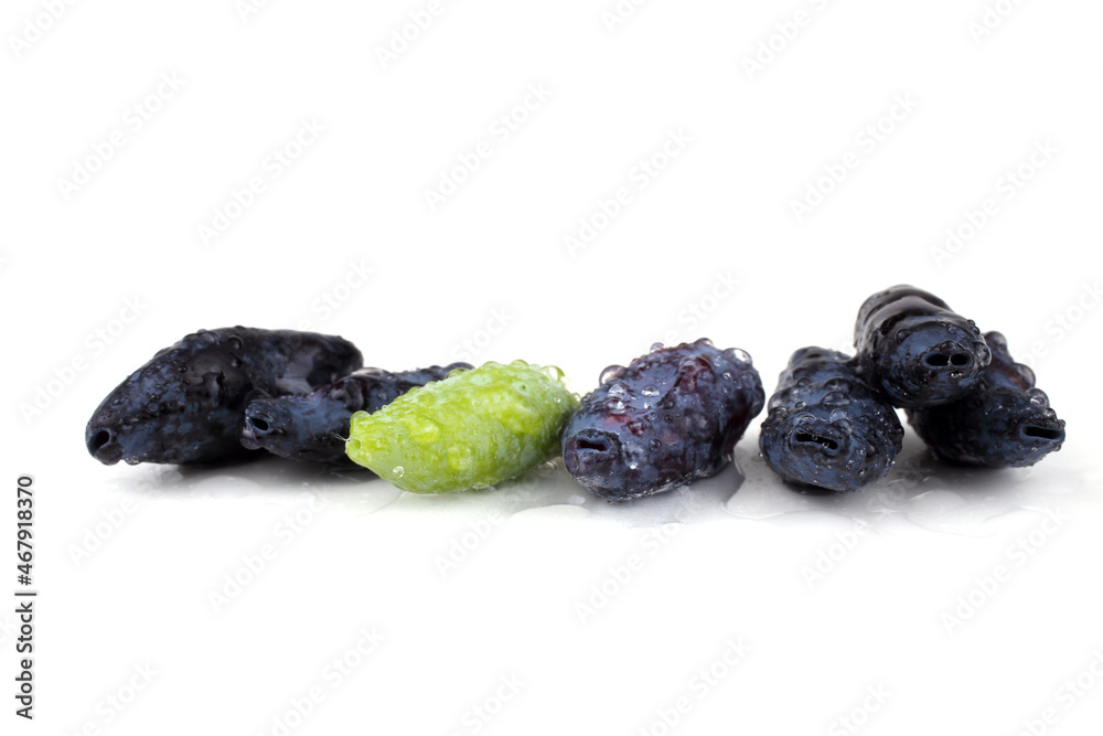 Haskap berries isolated on white Haskap berries isolated on white