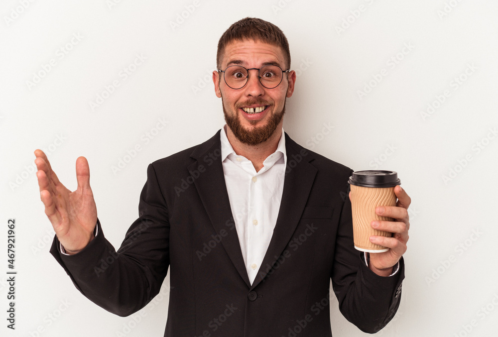Young business caucasian man holding take away coffee isolated on white background receiving a pleasant surprise, excited and raising hands. Young business caucasian man holding take away coffee isolated on white background receiving a pleasant surprise, excited and raising hands.
