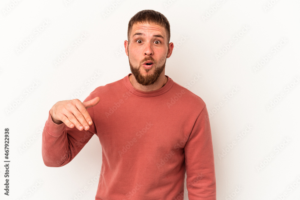 Young caucasian man with diastema isolated on white background laughing about something, covering mouth with hands. Young caucasian man with diastema isolated on white background laughing about something, covering mouth with hands.