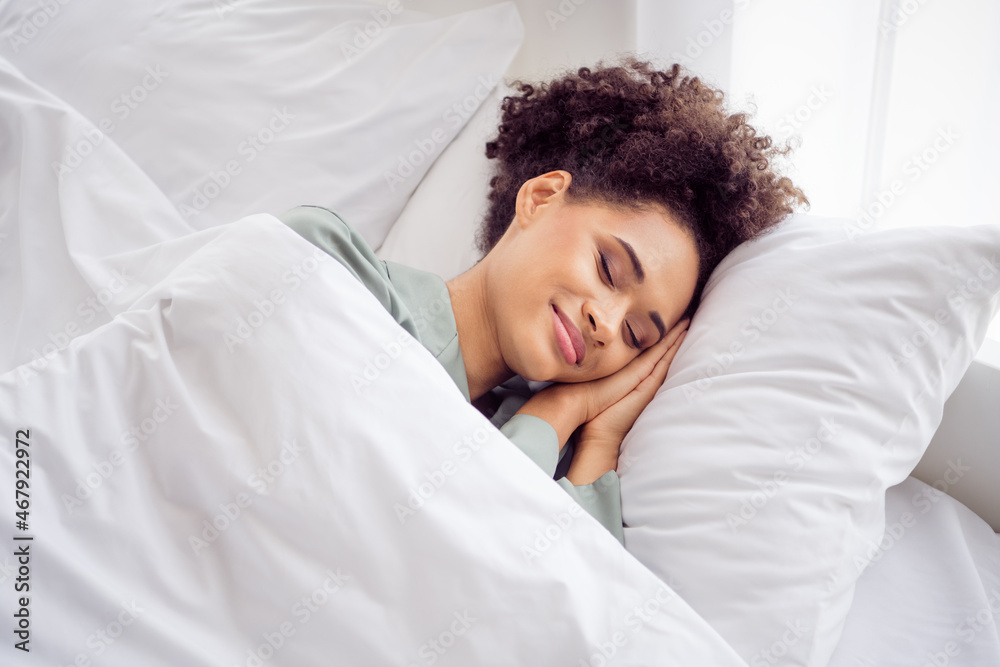 Portrait of attractive cheery wavy-haired girl sleeping calm peaceful at light white home house indoors Portrait of attractive cheery wavy-haired girl sleeping calm peaceful at light white home house indoors
