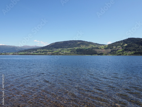 Landscape of Vangsvatnet lake at european Voss town in Norway photo