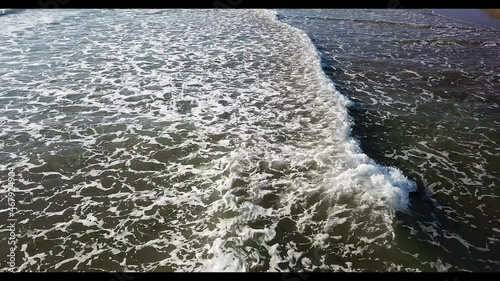Wavy sea on the coast of the Mediterranean. Antalya beaches with golden sand and clean sea.