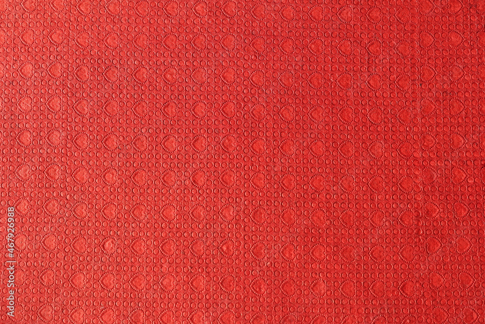 simple handmade red paper texture used as background high-resolution image. textured Christmas red paper used for decorative purpose wallpaper with heart pattern.