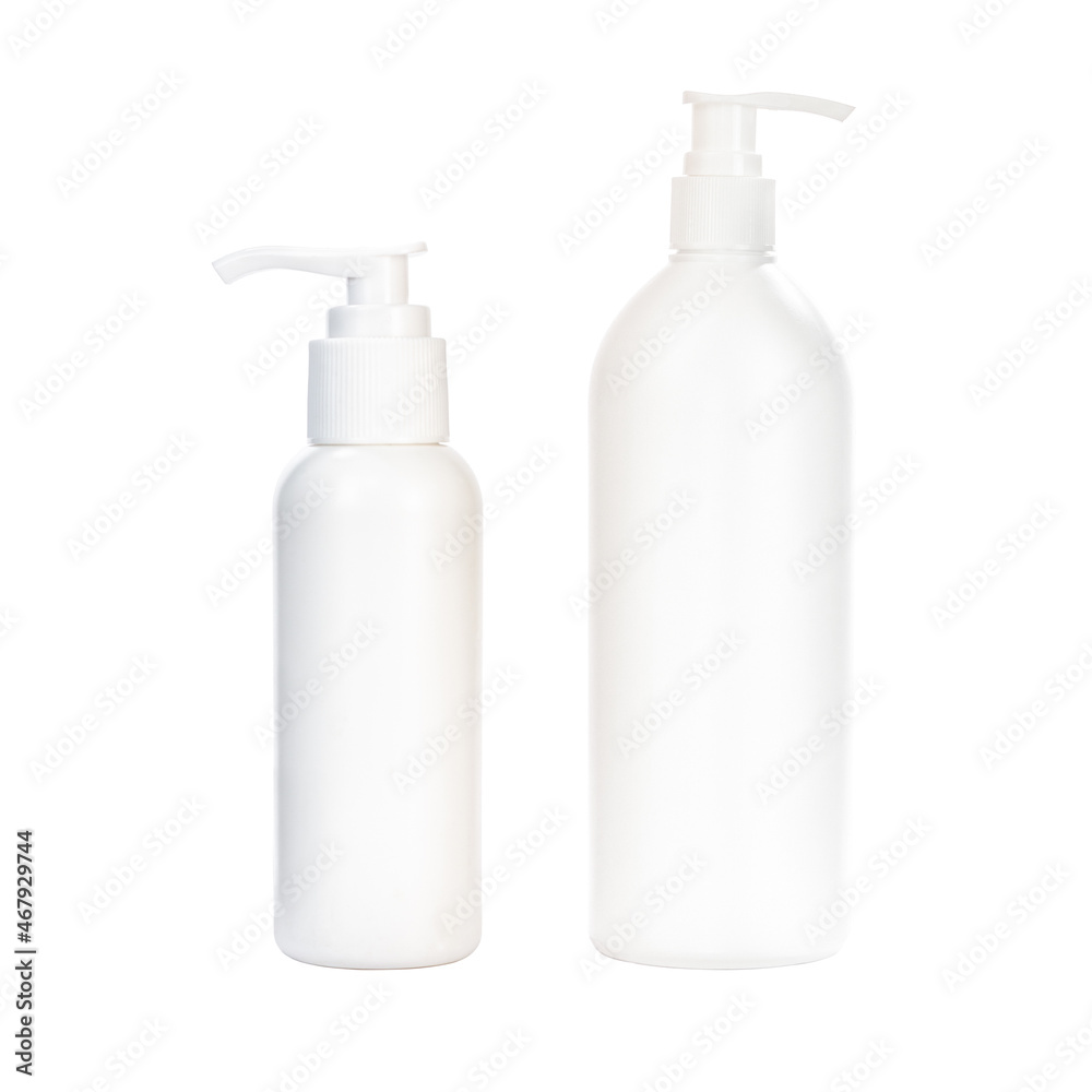 Two cosmetic white bottles with dispensers of different volumes on a white background Two cosmetic white bottles with dispensers of different volumes on a white background