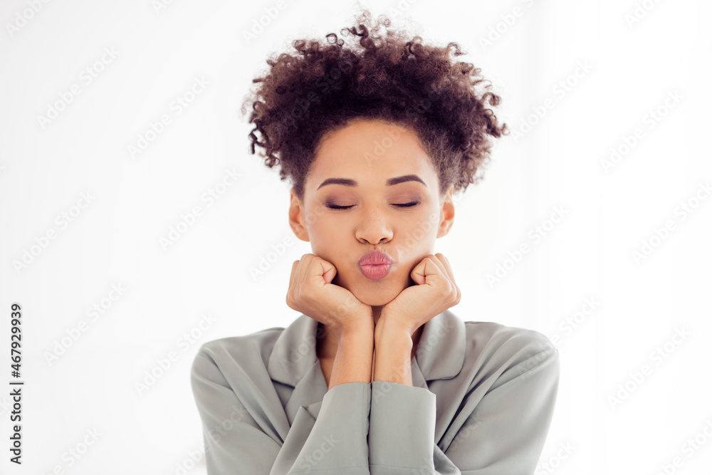 Photo of young pretty afro girl awakening pouted lips send air kiss romantic date dreamy girlfriend indoors Photo of young pretty afro girl awakening pouted lips send air kiss romantic date dreamy girlfriend indoors