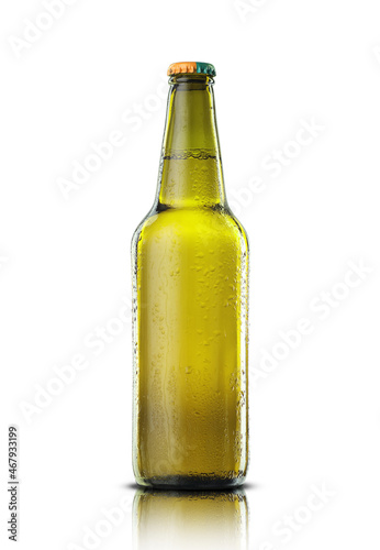 green bottle with beer in drops