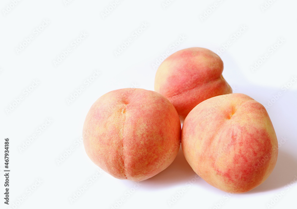 Three of Fresh Ripe Peaches Isolated on White Backdrop Three of Fresh Ripe Peaches Isolated on White Backdrop