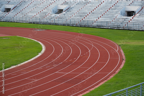 Red running track in sport stadium