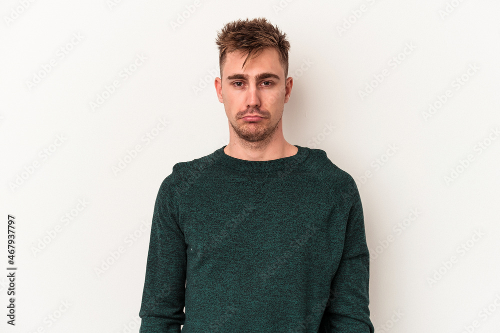 Young caucasian man isolated on white background sad, serious face, feeling miserable and displeased. Young caucasian man isolated on white background sad, serious face, feeling miserable and displeased.