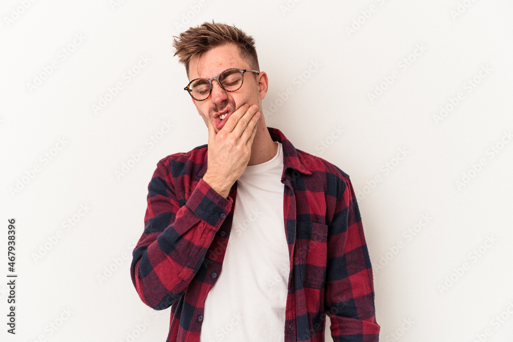 Young caucasian man isolated on white background having a strong teeth pain, molar ache. Young caucasian man isolated on white background having a strong teeth pain, molar ache.