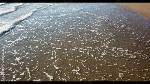 Wavy sea on the coast of the Mediterranean. Antalya beaches with golden sand and clean sea.