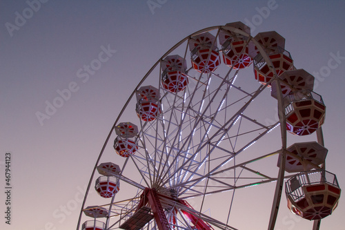Ferris wheel. Wheel attraction. Ferris wheel night images. A luminous ferris wheel in the night sky